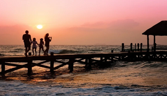 An image of a family viewing the sunset.