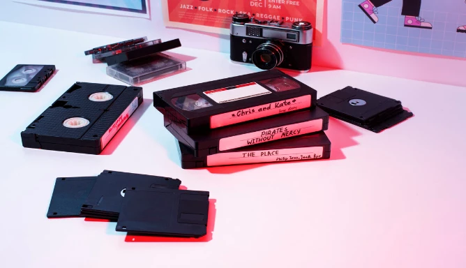Image of video tapes, audio tapes, floppy discs, and camera.